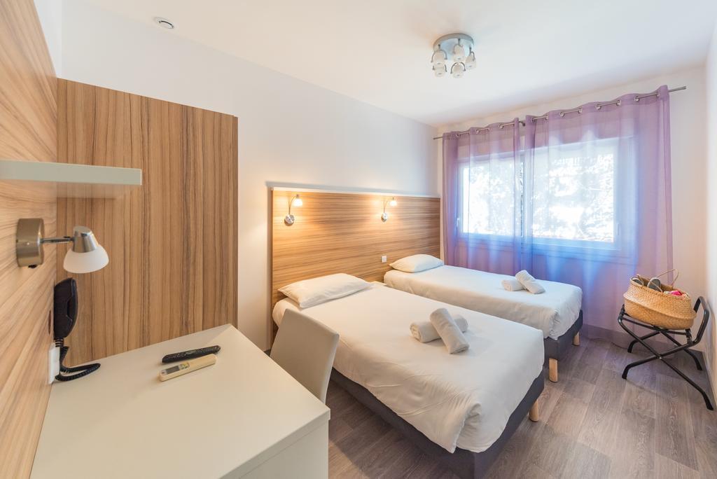 L'Oasis Hotel Frejus Bagian luar foto