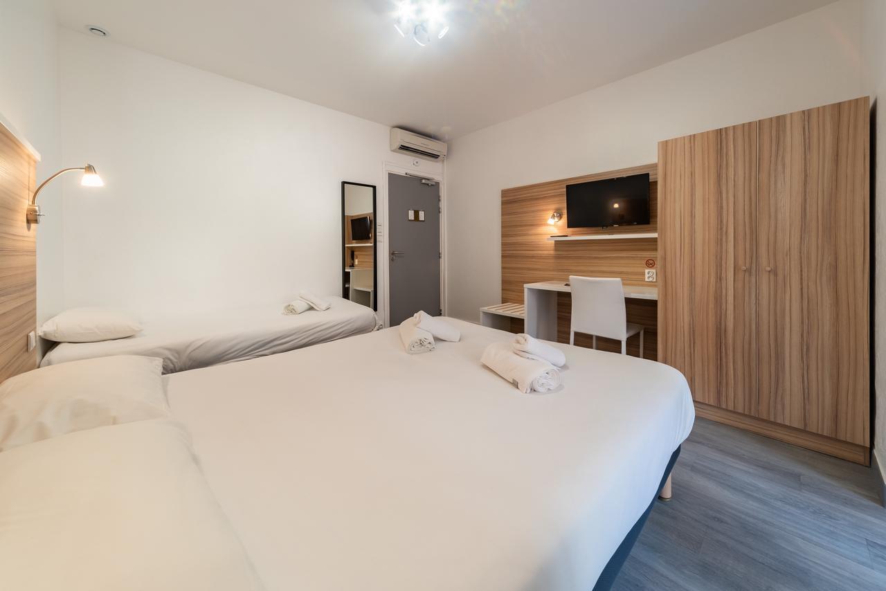 L'Oasis Hotel Frejus Bagian luar foto