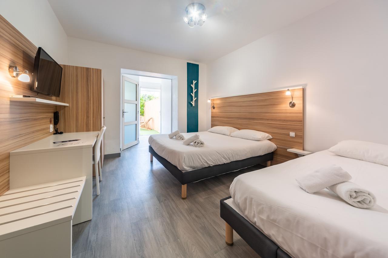 L'Oasis Hotel Frejus Bagian luar foto
